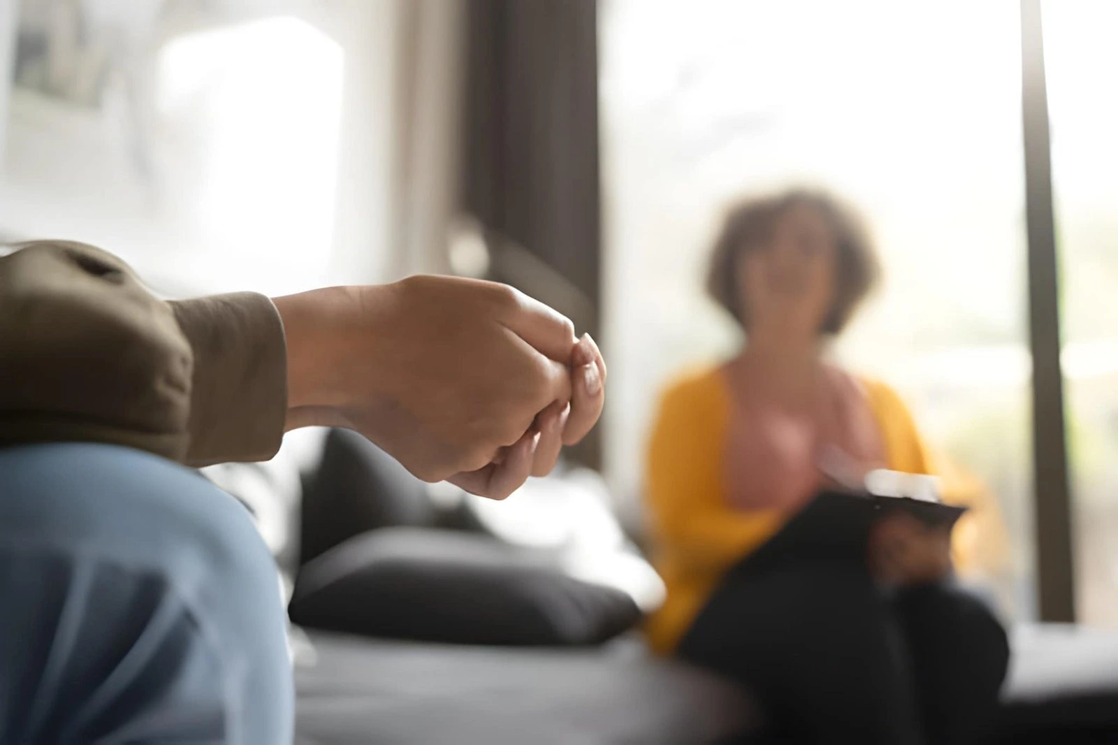 counseling session - Answers LLC - Answers LLC Therapist in Idaho Falls speaking with a client during a counseling session