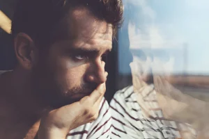 Person reflecting on signs they may need therapy in Idaho Falls